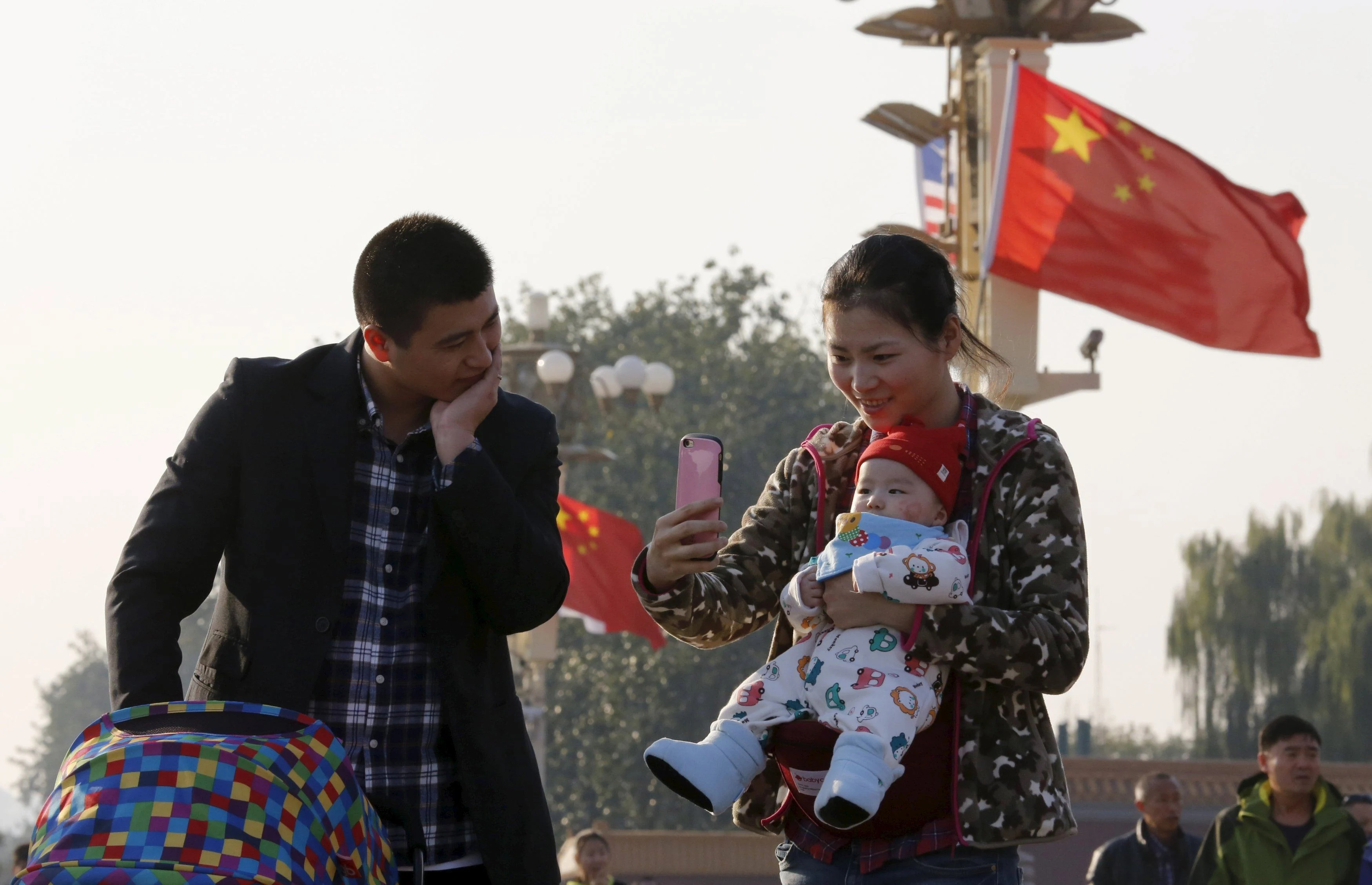 Chinezii, plătiți de stat ca să aibă copii